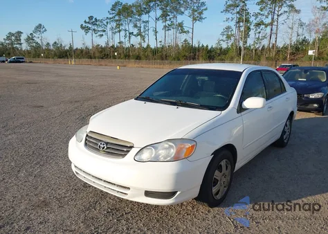 2004 Toyota Corolla Le z USA, uszkodzony, nr VIN 2T1BR32E34C274751